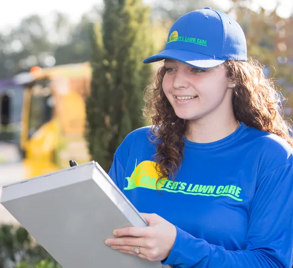 landscape service tech taking notes