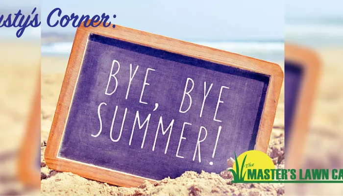 Chalkboard in the sand that says bye bye summer!
