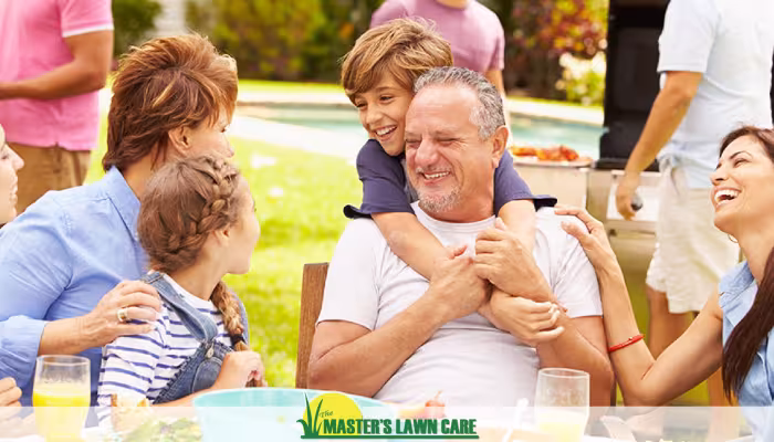 family enjoying outdoor bbq