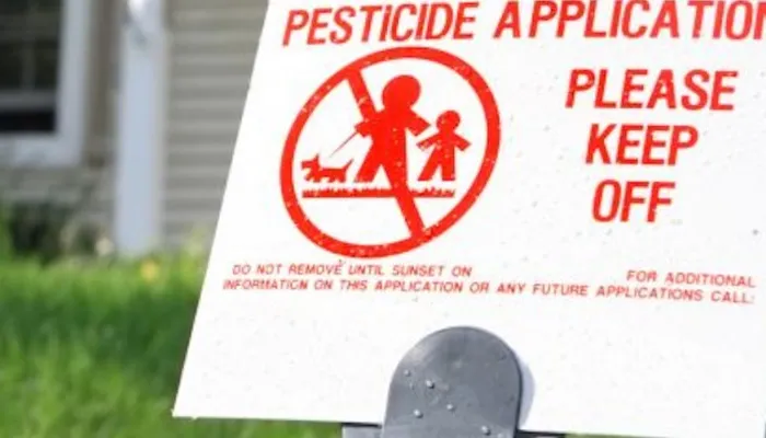 pesticide application yard sign