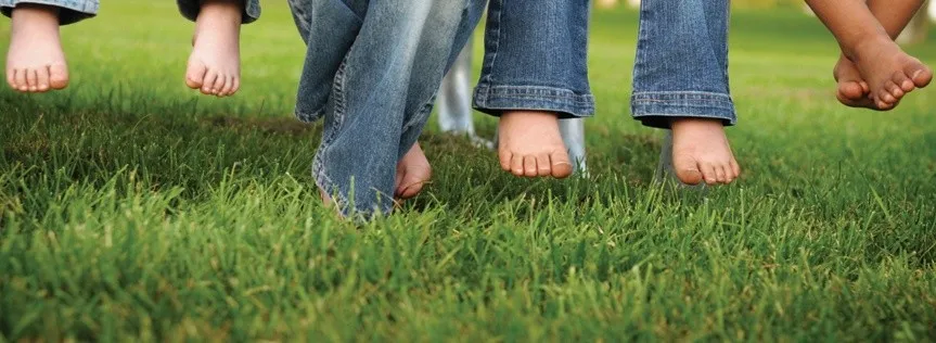 kids toes in grass