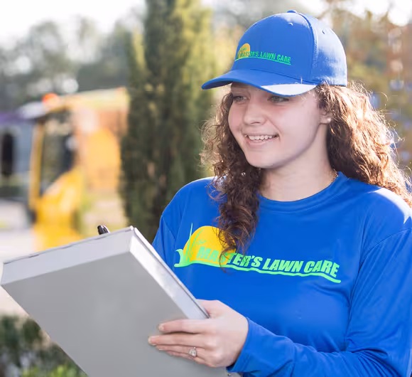 landscape service tech taking notes