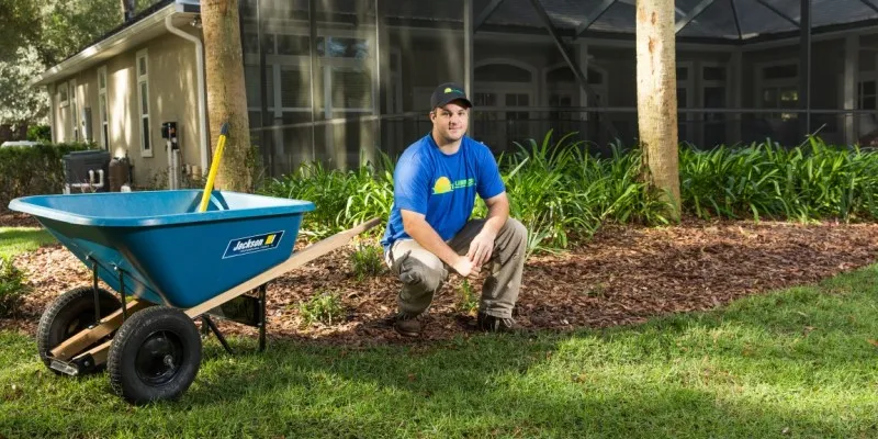 landscaping team member working in yard