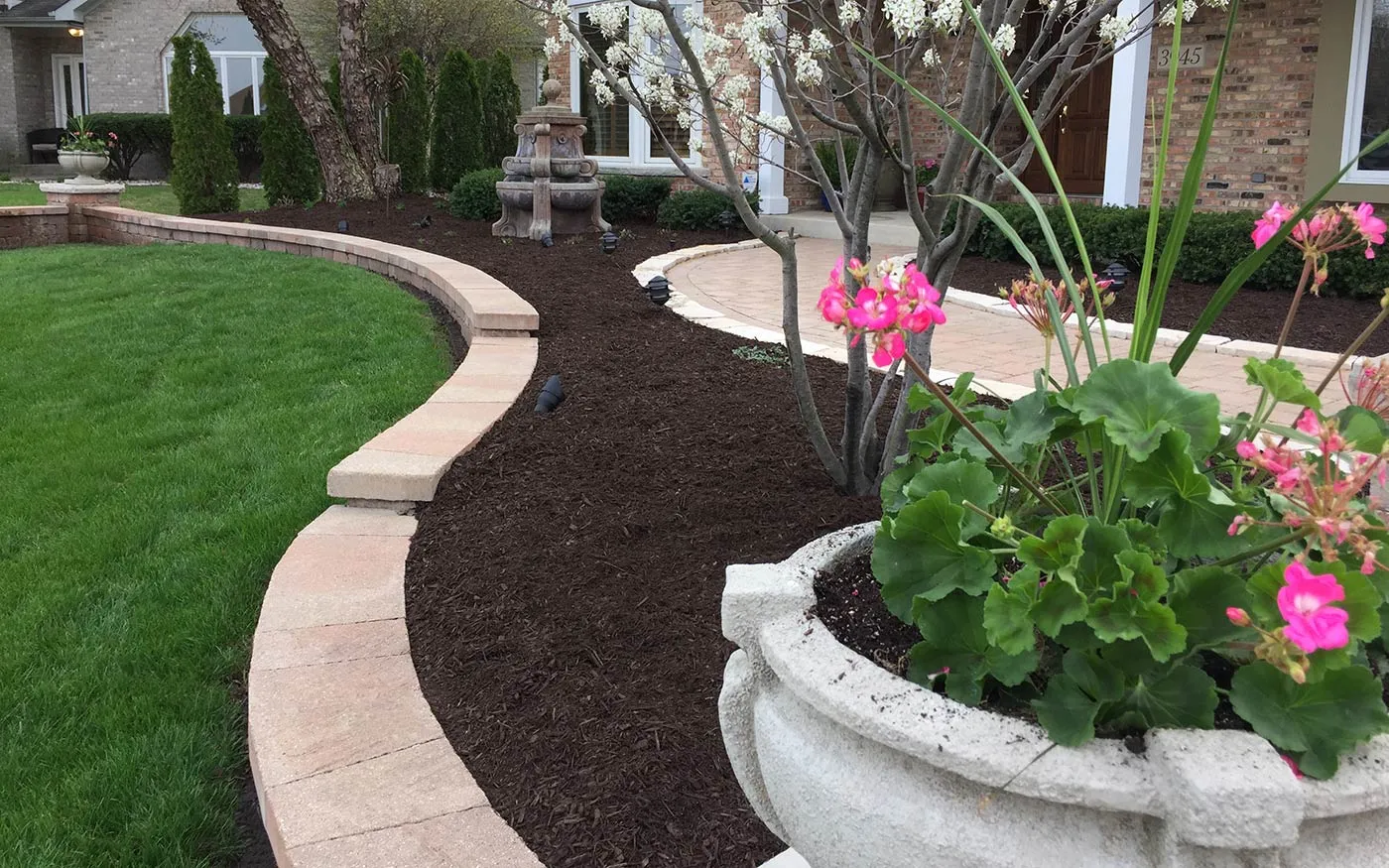 freshly laid mulch in garden bed