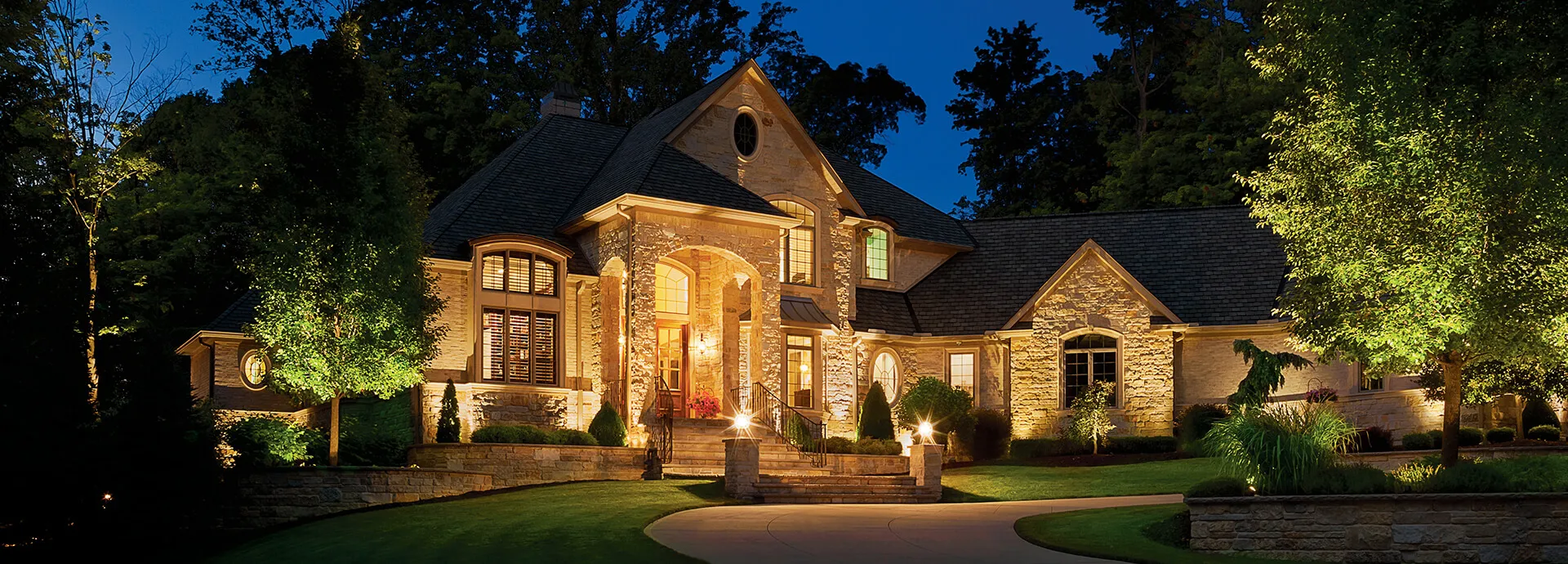 Outdoor Landscape Lighting on a stone home